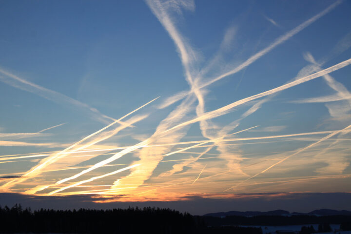 Vapour trails from aeroplanes in the sky