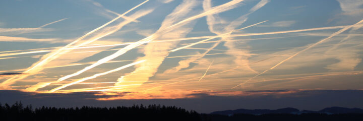 Vapour trails from aeroplanes in the sky