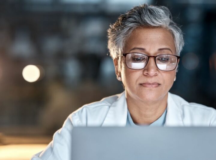 A lady working at a laptop